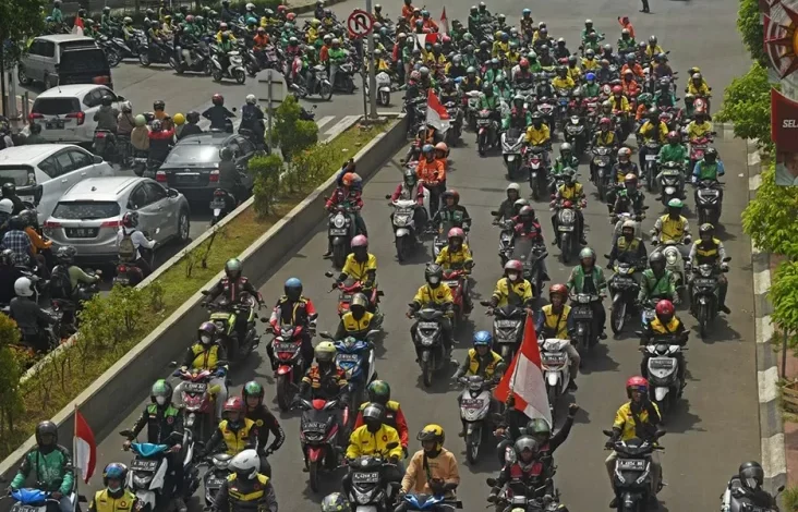 THR Ojol Cair Berupa Bonus Hari Raya, Begini Respons Grab kemudian Gojek